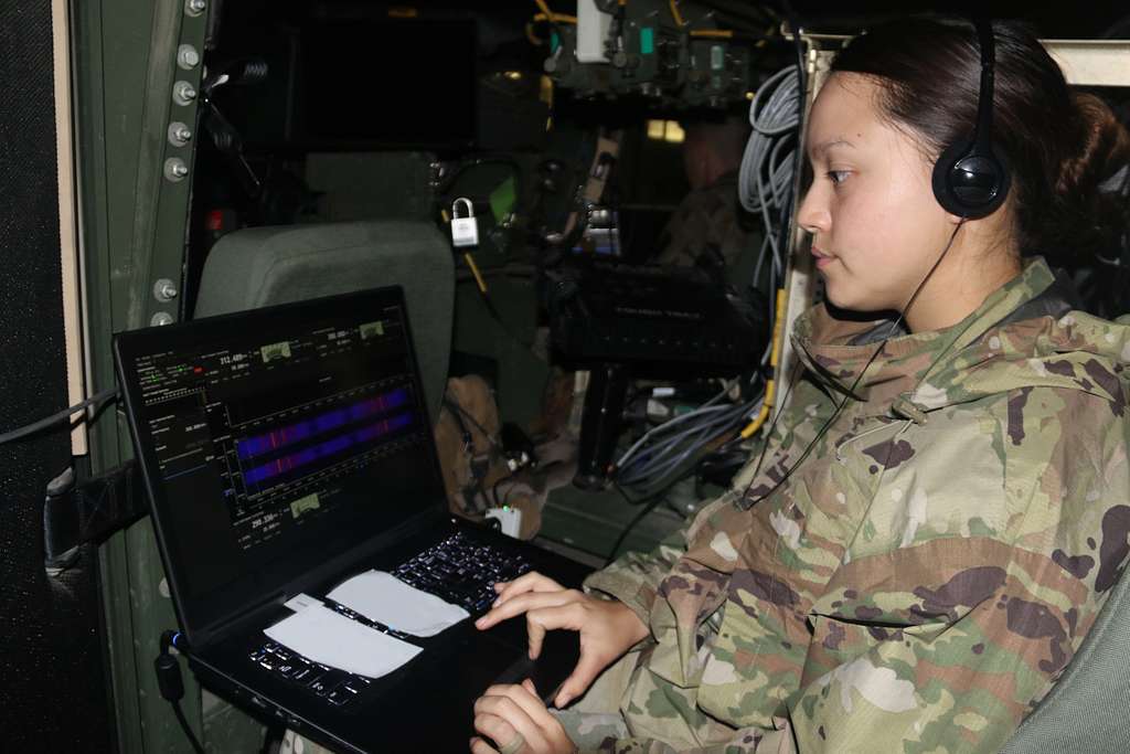 A U.S. Army signals intelligence analyst working at a computer during training